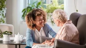 Smiling Senior and caregiver 